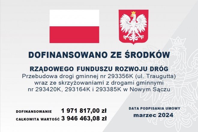 Tablica informująca o otrzymaniu dofinansowania na remont ul. Traugutta
